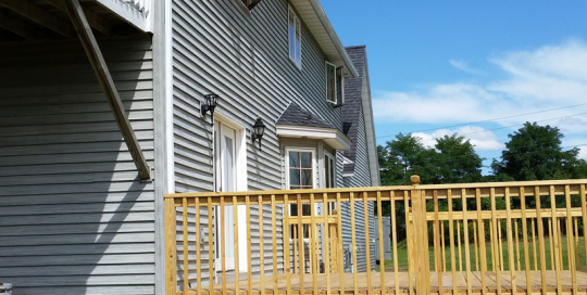 Downspout through existing deck